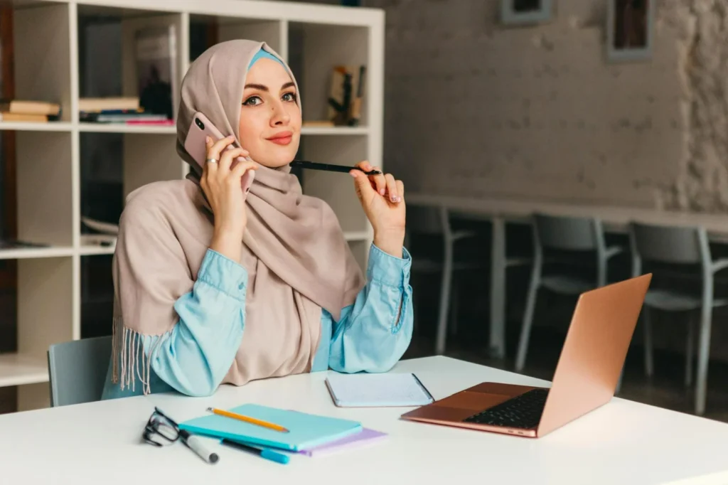 Muslim Women Talking on Phone